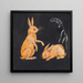 Two rabbits on a black background, decorative sketch - P C Skovgaard — framed artwork on a wall