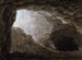Een grot in het platteland - John Robert Cozens — weergave van het kunstwerk
