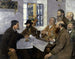 De politici van het dorp - Max Buri — weergave van het kunstwerk