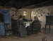 De vrienden en familie van de kunstenaars zittend rond een tafel in Vejby, Noord-Zeeland - P. C. Skovgaard — weergave van het kunstwerk