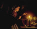 Een markt scène bij kaarslicht - Petrus van Schendel — weergave van het kunstwerk