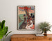 Normandië vintageposter – Trouville, Casino Municipal, ingelijst boven een houten dressoir tussen planten.