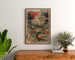 Vintage Cannes poster, Grand Hôtel des Pins, framed above a wooden dresser between plants.