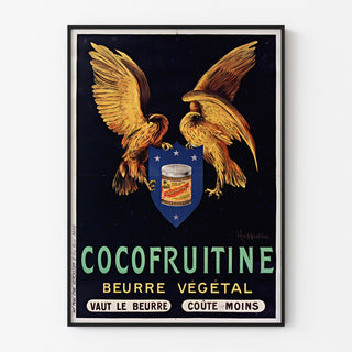 Vintageposter Cocofruitine, plantaardige boter, getoond in een smal lijstje tegen een lichte muur.