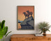 Vintage National Parks "Preserve Wild Life" poster, framed above a wooden sideboard, between plants.