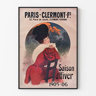Vintage poster Paris-Clermont, winters seizoen, getoond in een smal lijstje tegen een lichte muur.