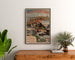 Vintage Paris Lyon Méditerranée, Jura poster framed above a wooden dresser between plants.