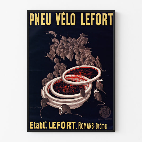 Vintage poster Fietsbanden Lefort, tentoongesteld in een smal lijstje aan een lichte muur.