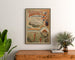 Vintage poster Touraine, tuin van Frankrijk, ingelijst boven een houten ladekast, tussen planten.