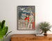 Vintage poster Vernet-les-Bains, Canigou, ingekaderd boven een houten dressoir, tussen planten.