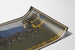 Poster Yellowstone-Park, gepresenteerd op een gebogen blad, in perspectief bekeken.